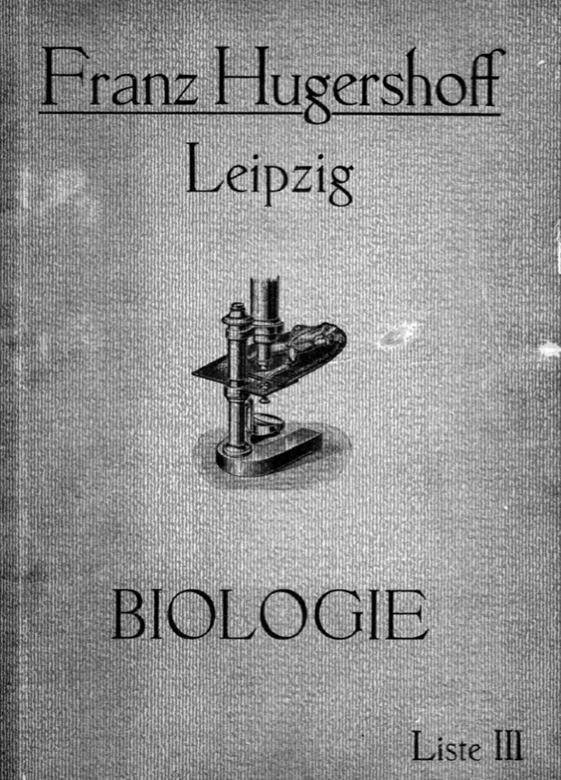 A book cover with a microscope
Description automatically generated