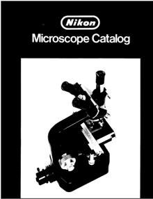 A black and white cover of a microscope
Description automatically generated
