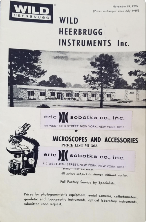 A black and white photo of a building
Description automatically generated