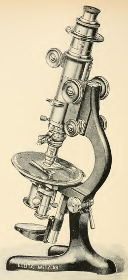 A close-up of a microscope
Description automatically generated with medium confidence