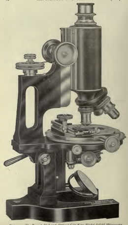 A picture containing wall, indoor, microscope, old
Description automatically generated