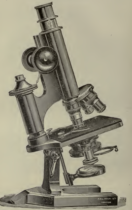 A picture containing indoor, microscope
Description automatically generated