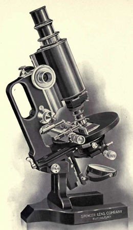 A picture containing microscope, indoor
Description automatically generated