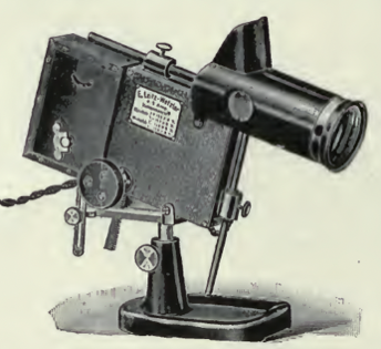 A picture containing appliance, black, old
Description automatically generated