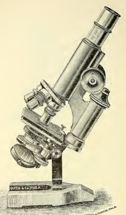 A picture containing text, old, gear, object
Description automatically generated