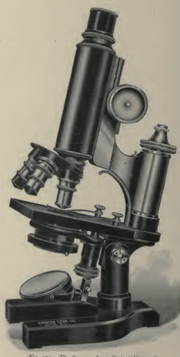 A picture containing indoor, microscope
Description automatically generated