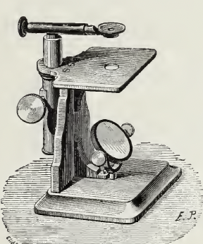 A picture containing text, wooden, old, device
Description automatically generated