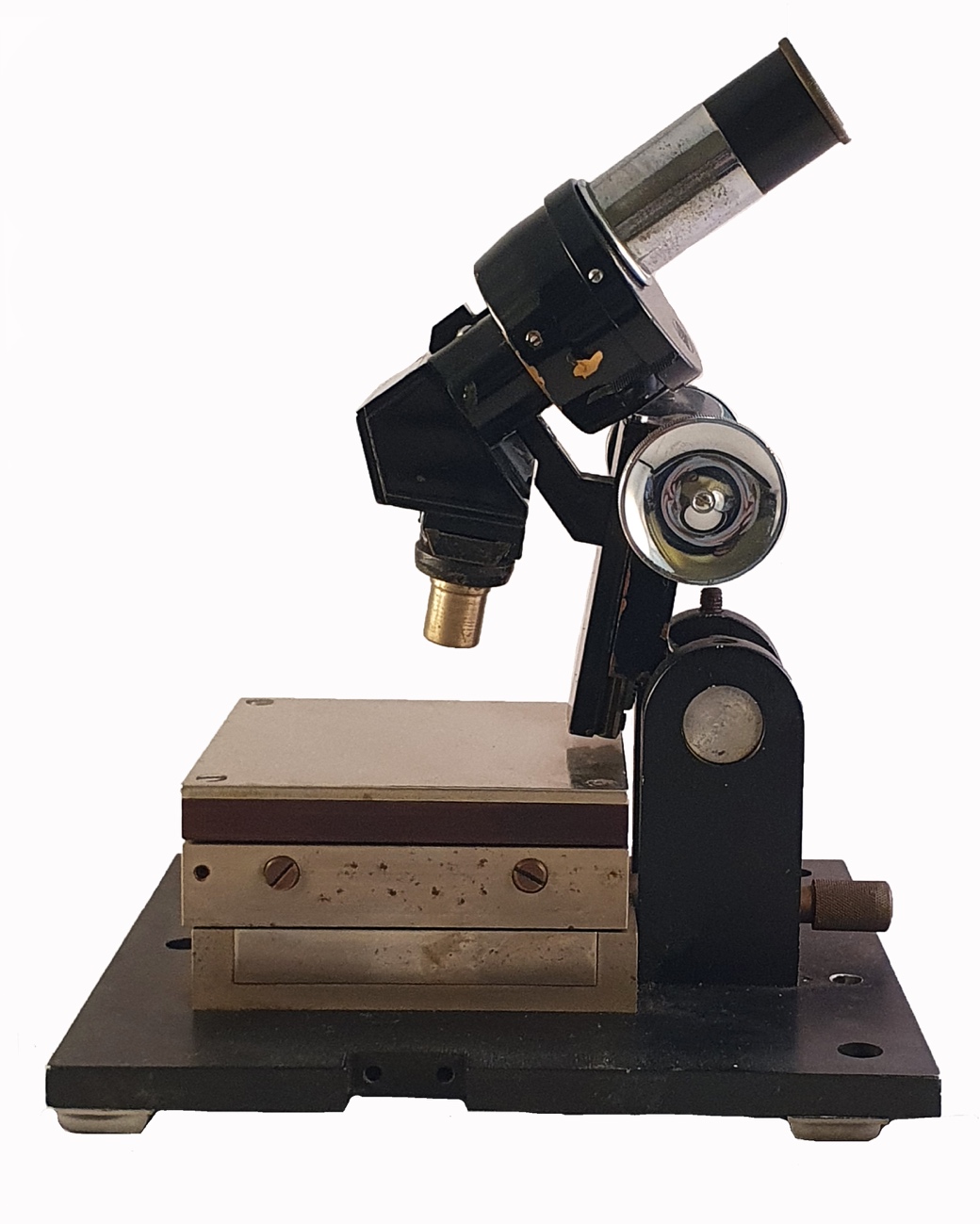 Improved Microscope A close-up of a microscopeDescription automatically generated