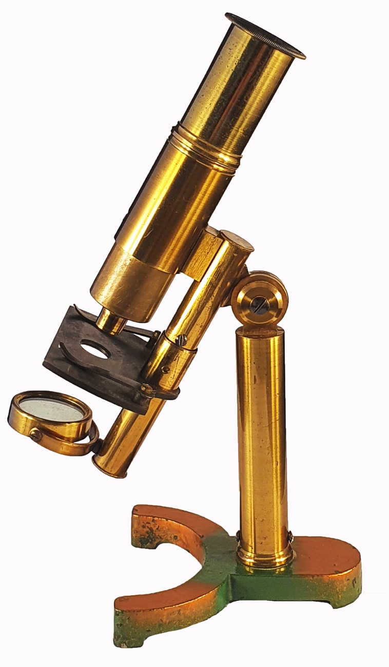A close-up of a gold microscopeDescription automatically generated